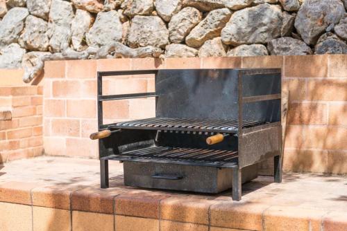 Kemudahan BBQ tersedia untuk tetamu di vila ini