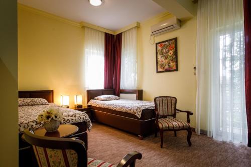 เตียงในห้องที่ Villa Modena