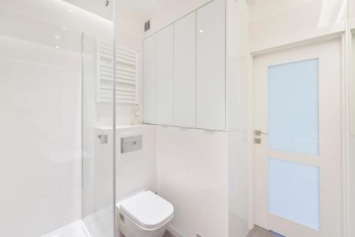 Kúpeľňa v ubytovaní Apartamenty Grobla III Q4Apartments