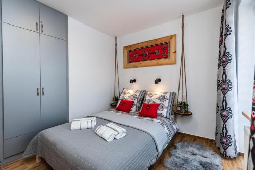 Posteľ alebo postele v izbe v ubytovaní Apartament Hanki przy Krupówkach