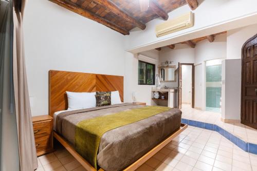 Ένα ή περισσότερα κρεβάτια σε δωμάτιο στο Castillo Blarney Inn