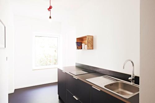 A kitchen or kitchenette at SOON appartements