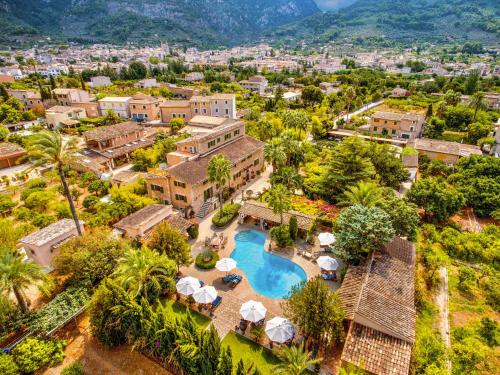 an aerial view of a resort with a swimming pool at Son Grec Petit Resort - Adults Only in Sóller