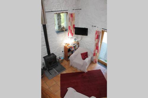 an aerial view of a living room with a fireplace at The Dairy @ Mill Haven Place in Haverfordwest