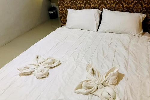 Katil atau katil-katil dalam bilik di Trion Homestay
