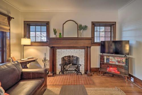 a living room with a couch and a fireplace at Bristol Bungalow Less Than 1 Mi to Country Music Museum in Bristol