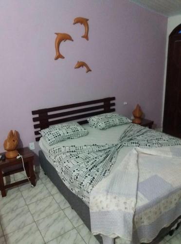 Postel nebo postele na pokoji v ubytování Pousada Coruja Branca