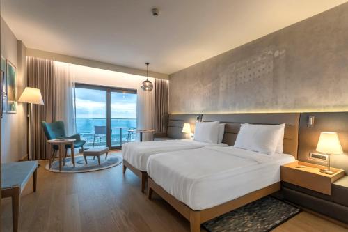 Ένα ή περισσότερα κρεβάτια σε δωμάτιο στο Radisson Blu Hotel Trabzon