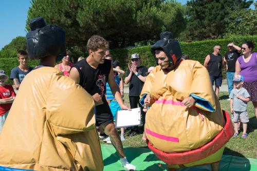 a group of people dressed up in inflatable people in costumes at Camping L'Ocean in Brem-Sur-Mer
