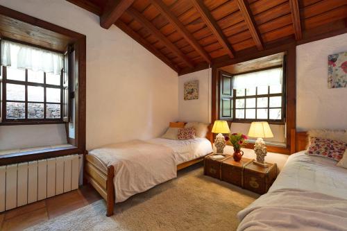 Ein Bett oder Betten in einem Zimmer der Unterkunft Casa Calimera