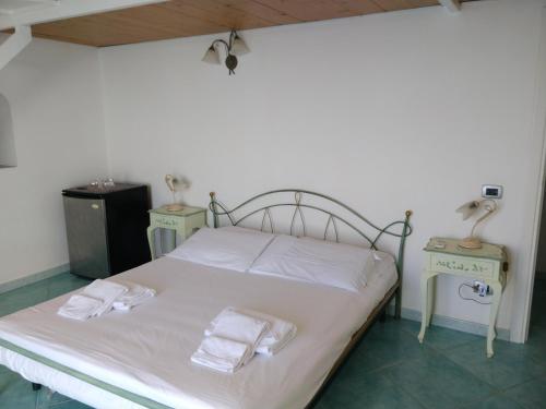 Letto o letti in una camera di Villa Casola B&B