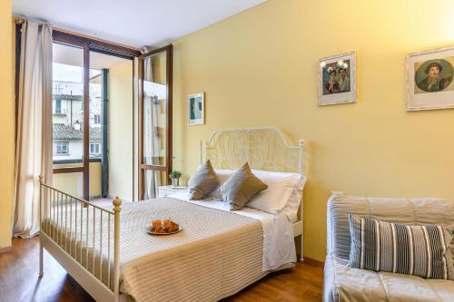 Postel nebo postele na pokoji v ubytování Terrace on Duomo Luxury Flat