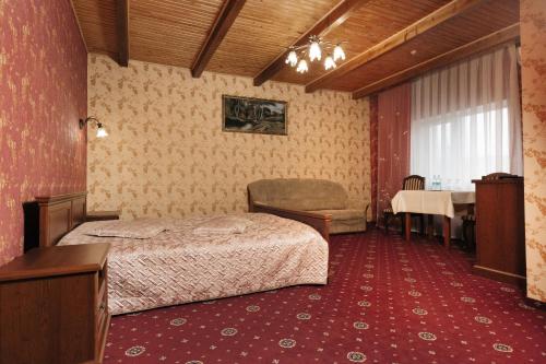 Ліжко або ліжка в номері Станіславський Двір