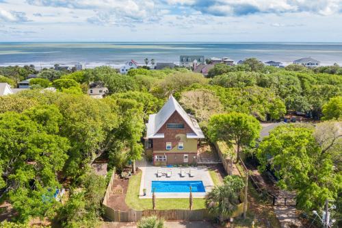 an aerial view of a house with a swimming pool at 512 E Cooper-The Wave House in Folly Beach
