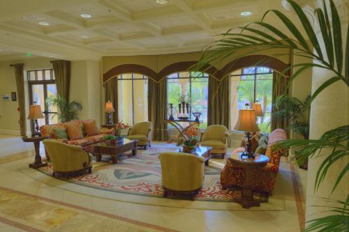 a large living room with a couch and chairs at Club Wyndham Bonnet Creek in Orlando