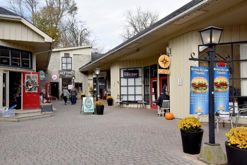 a group of shops on a street in a town at Staybridge Suites - Waterloo - St. Jacobs Area in Waterloo