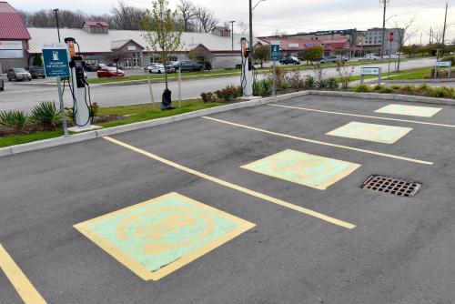 an empty parking lot with drawings on the ground at Staybridge Suites - Waterloo - St. Jacobs Area in Waterloo