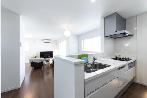 Dapur atau dapur kecil di The Beachfront House ビーチフロントの一軒家 4名迄