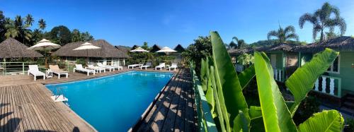a view of a swimming pool at a resort at Akasa Goa in Palolem