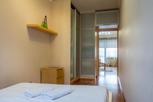 Кровать или кровати в номере Central Apartments Maidan Area