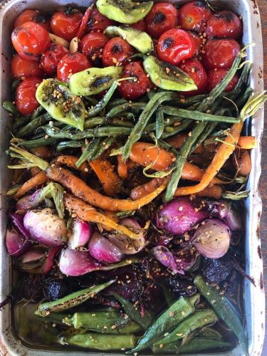 a plastic container filled with vegetables sitting on a table at 0031 Boutique Hotel & Restaurant Cumbuco in Cumbuco