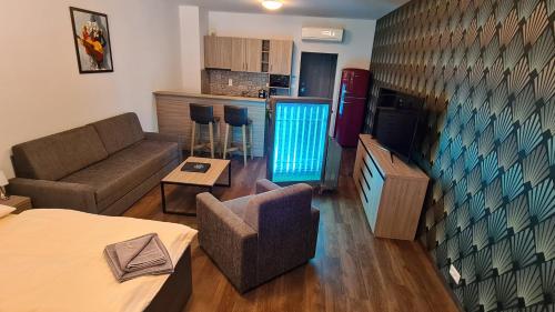 Area soggiorno di Barok Hotel and Apartments