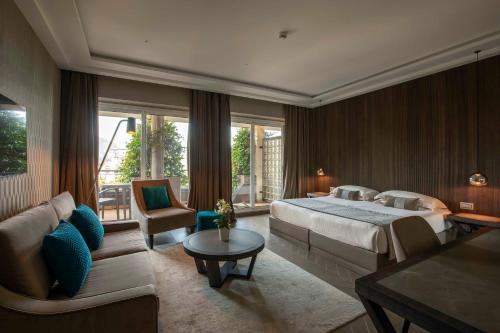 Postel nebo postele na pokoji v ubytování Hotel La Palma