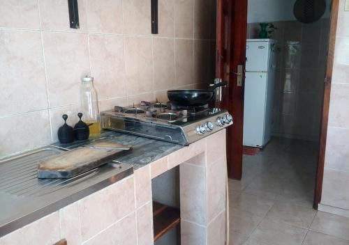 A kitchen or kitchenette at Ruby - Casa de Hospedes - Backpackers