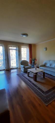 Posezení v ubytování Bástya Apartmanház