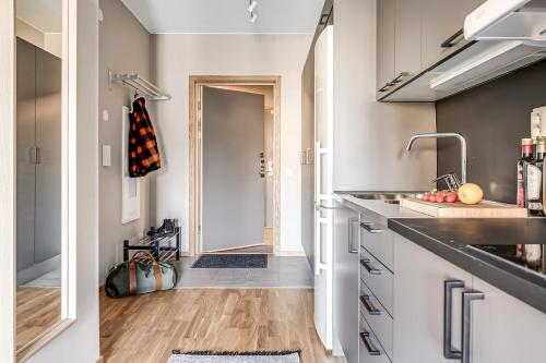 Kuchyň nebo kuchyňský kout v ubytování Apartments Mölndal