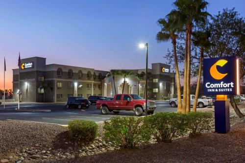 a truck parked in a parking lot in front of a building at Comfort Inn & Suites Surprise Near Sun City West in Surprise