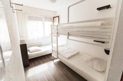 Postel nebo postele na pokoji v ubytování City Hostel Geneva