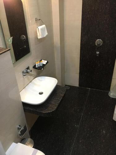 Un baño de Hotel Ozas Grand
