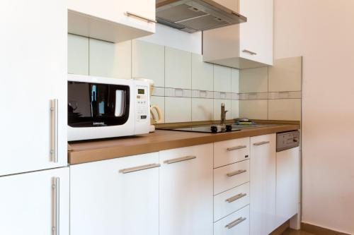 Η κουζίνα ή μικρή κουζίνα στο Montenegro Apartments Utjeha