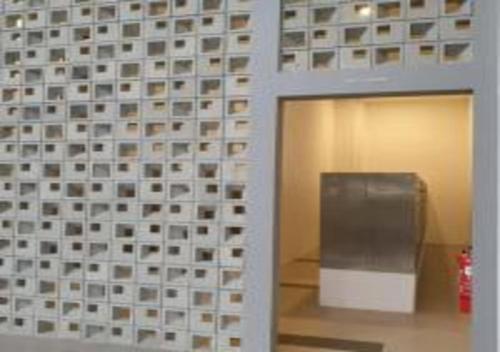 a room with a wall with a glass door at KLIA Glorybnb Bell Suites in Sepang