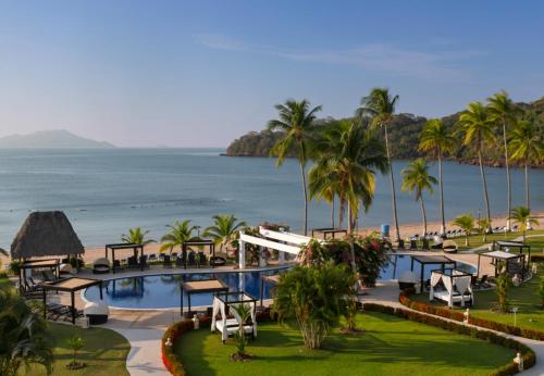 a view of the beach from the resort at Dreams Playa Bonita All Inclusive in Playa Bonita Village
