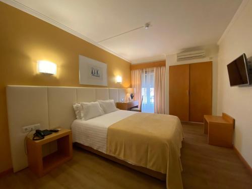 Кровать или кровати в номере Hotel Mare