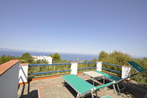 a view from the balcony of a house with a pool at Villa Eva in Anacapri