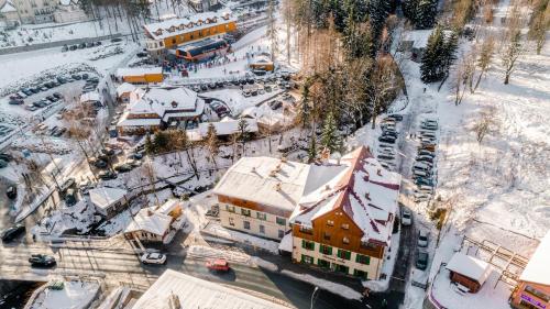 an aerial view of a city covered in snow at Leśny Dwór Karpacz Piekarnia Mio Padre Restauracja Mamma Mia in Karpacz