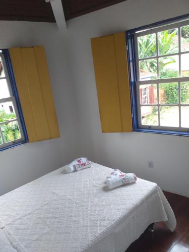 Ένα ή περισσότερα κρεβάτια σε δωμάτιο στο Loft Largo do Ó