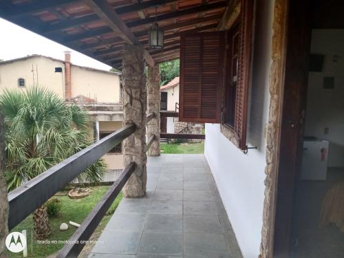 a room with a view of the courtyard of a house at Pousada Nova Conquista in Penedo
