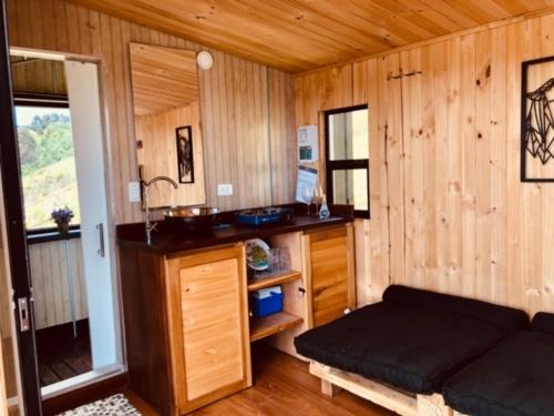 Kuchyň nebo kuchyňský kout v ubytování EnCubo Glamping Guatavita