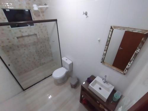 Un baño de Residencial Pérola - Localizado entre a Pinheira e a Guarda do Embaú