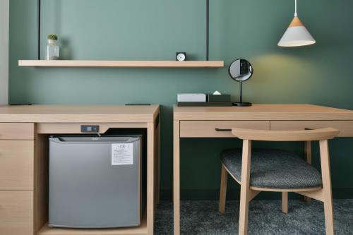Kuchyň nebo kuchyňský kout v ubytování REF Omiya by VESSEL HOTELS