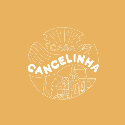a logo for a travel agency with a house and the words casa carolina at Mountainhome Casa Cancelinha in Soito