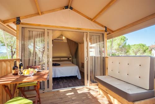 Postel nebo postele na pokoji v ubytování Camping Europa