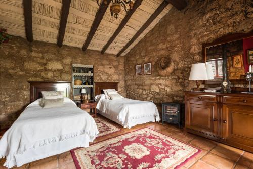 Een bed of bedden in een kamer bij Casa Rural El Moral