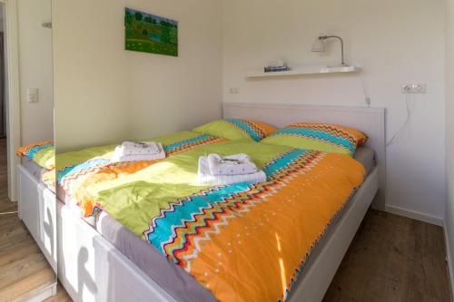 Ένα ή περισσότερα κρεβάτια σε δωμάτιο στο Ferienwohnung-in-Luebesse