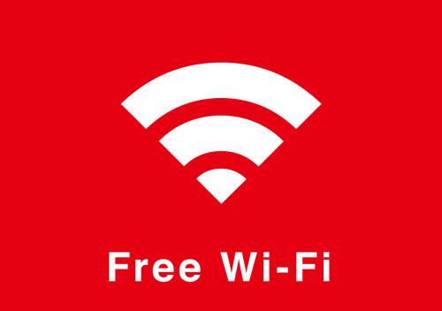 a red sign with the words free wi fi at Hotel Benkyo Beya Amagasaki in Amagasaki