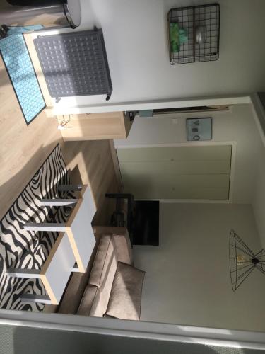 Posezení v ubytování Cosylocation La Varende 71